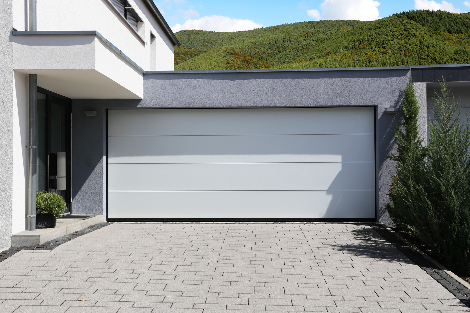 Modern white garage door (sectional door)
